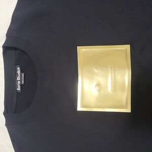 Acne Studios Black Sweater with Gold Emblem